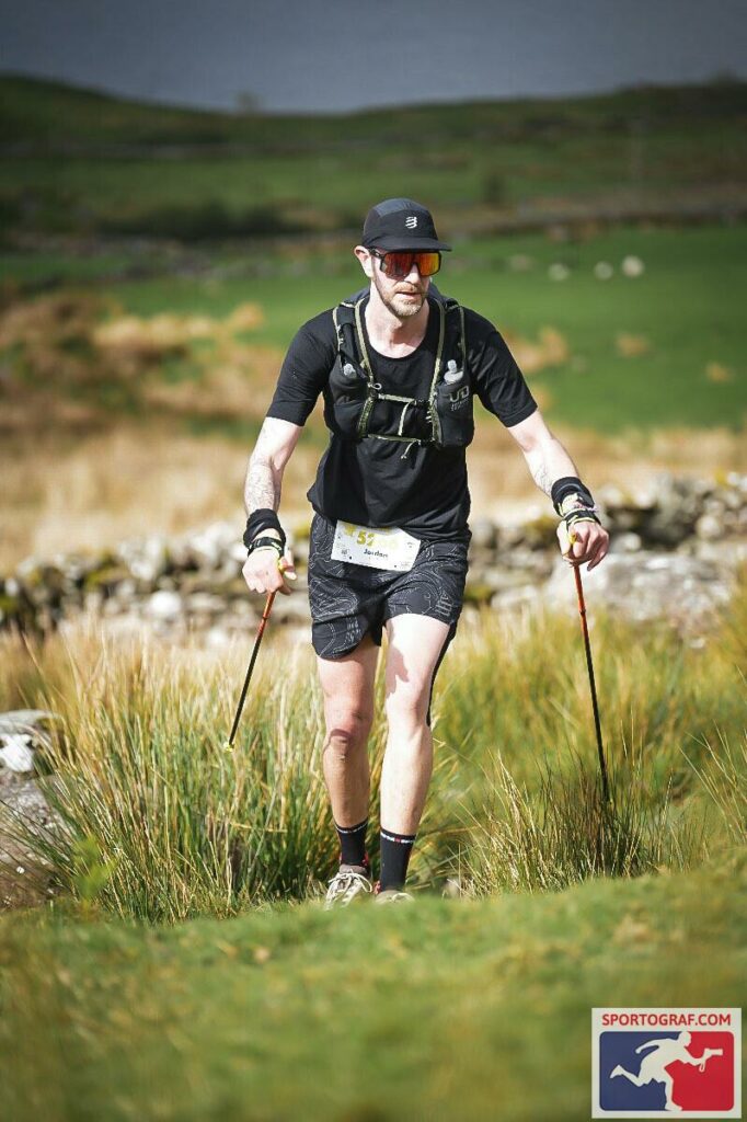 Jordan Collins Ultra Trail Runner ML and Crib Goch Outdoor Trail Running Expert Racing on grass